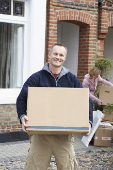 Moving day logistics for a Knightsbridge office relocation with boxes and trolleys