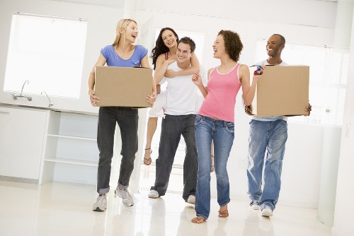 Furniture removal team planning a move in a Knightsbridge street