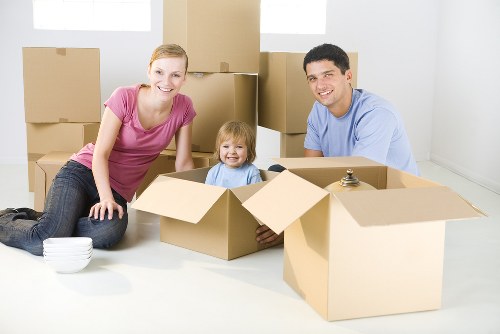 Furniture pick-up service handling a sofa collection in a Knightsbridge apartment building