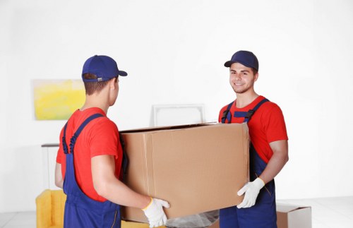 A local moving crew transporting fragile items in Knightsbridge