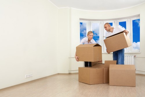Careful loading of furniture and boxes into a moving truck in Knightsbridge