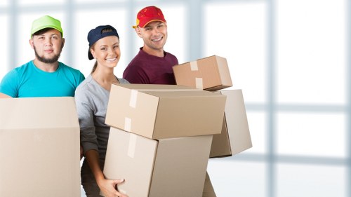 Removal team planning a house move in Knightsbridge near a townhouse street
