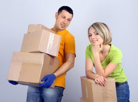 Moving boxes and furniture prepared for loading in Knightsbridge