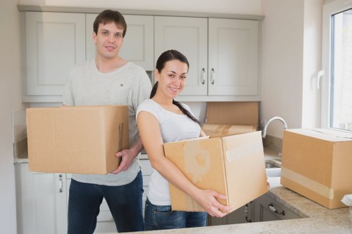 Furniture and boxes being moved from a Knightsbridge apartment building